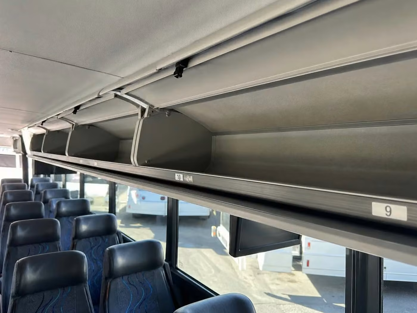 hollister 35 passenger minibus overhead storage