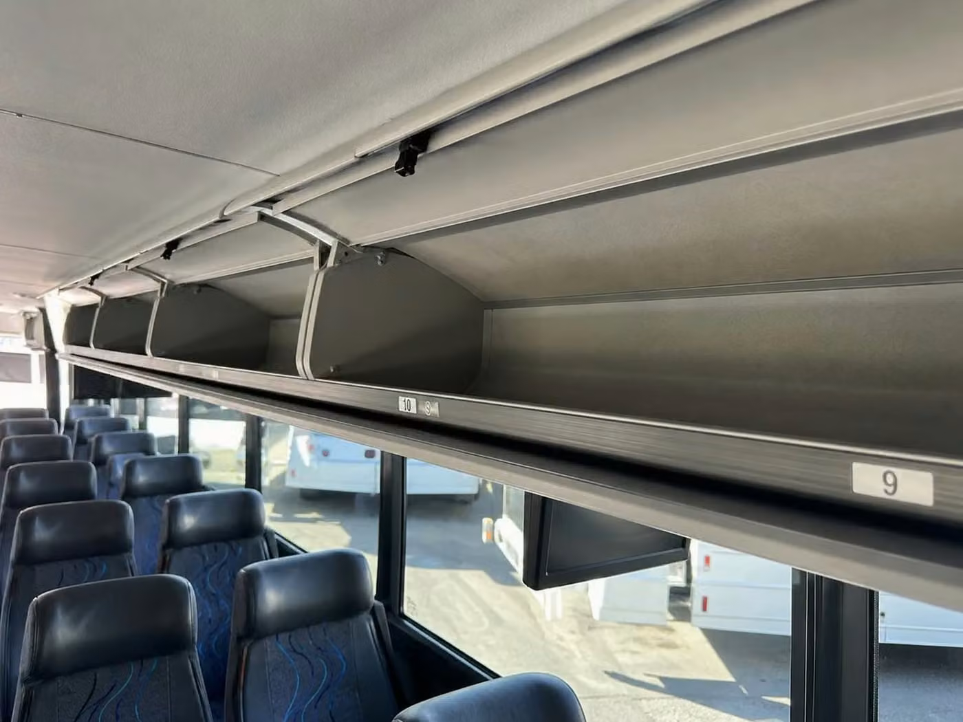 hollister charter bus overhead storage
